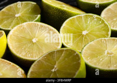 sliced lime on black background Stock Photo