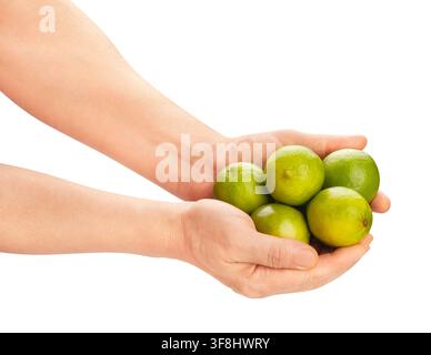 lime heap in hand path isolated on white Stock Photo