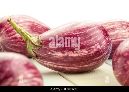 jewel marble eggplant on wood background on white Stock Photo