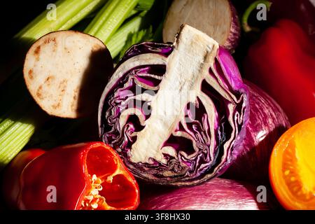 sliced red cabbage vegetable mix on black background Stock Photo