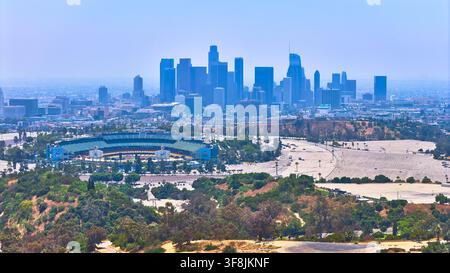 Aerial view of the Los Angeles skyline at sunset with pink sky and ...