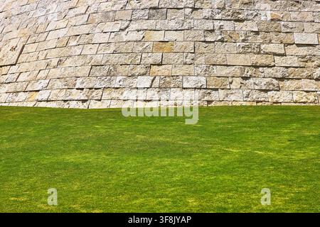 Modern Stone Wall and Green Lawn at Getty Center in Los Angeles Stock Photo