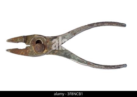 The old iron pliers are isolated. Rusty work tools. Stock Photo