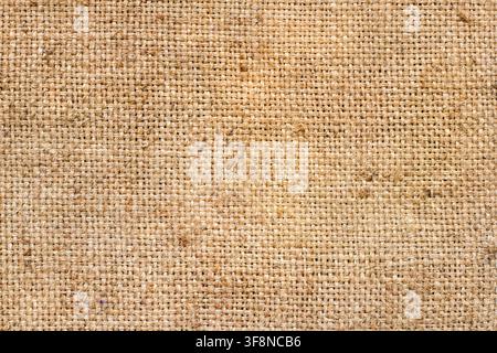 Natural brown burlap. Background texture. Surface of coarse fabric. Stock Photo