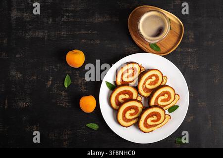 Artisan Swiss Roll Cake with Fruit Filling Overhead View Stock Photo