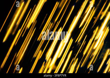 Dynamic motion background of fine yellow lines falling vertically like a matrix digital code Stock Photo