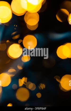 Festive abstract background showing blue and golden round light circles shimmering with smooth transitions Stock Photo