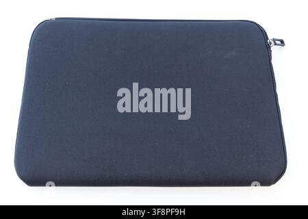 A dark blue neoprene laptop sleeve is on a white background Stock Photo
