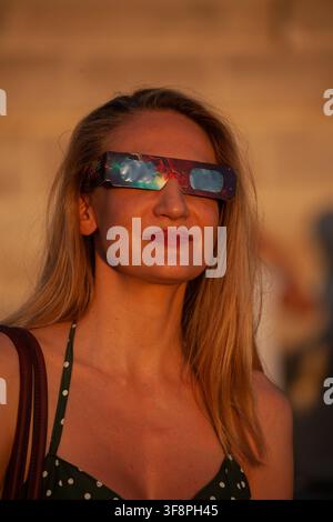 The solar eclipse has just taken place in Paris on August 12th, around 8 p.m. Stock Photo