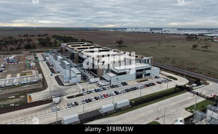 Large data center campus housing multiple buildings, external cooling systems, and extensive network infrastructure Stock Photo
