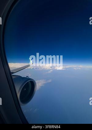 airplane-window-view-of-sky-from-inside-of-airplane-airplane-wing-and