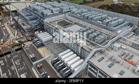 Large data center facility showing complex cooling systems and power components Stock Photo