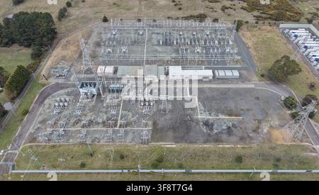 Transmission Array Aerial view of a large building with extensive solar panel arrays on ...