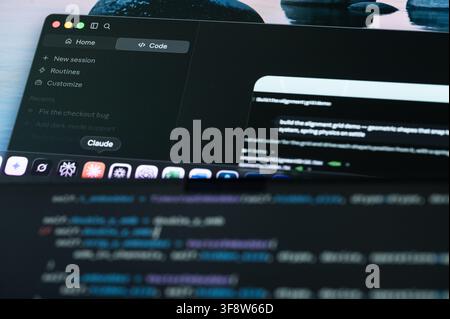 New York, USA - august 12, 2026: Vibe coding with Claude code Ai assistant on computer screen close up view Stock Photo