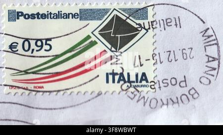 Modern Italian postage stamp for priority mail with Milano Borromeo postmark cancel Stock Photo