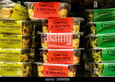 London UK, August 13 2026, Close-Up Of Pre-Packed Moroccan Style Fruit Couscous, Orzo Pasta, And SPinach Pasta On A Marks And Spencer Shelf Stock Photo