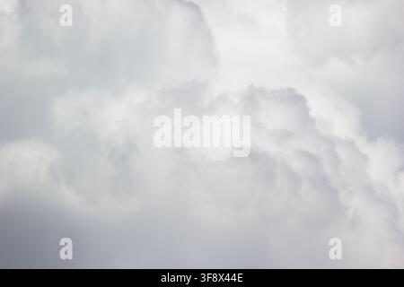 Overcast cloudy sky with soft white and gray storm texture background Stock Photo