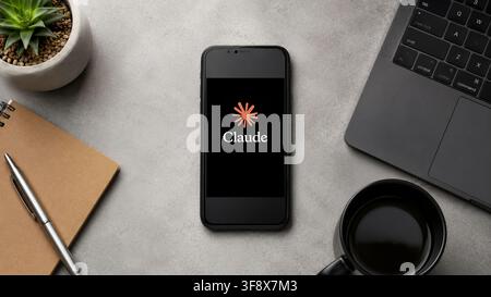 August 13, 2026: In this photo illustration, a smartphone displays the Claude AI app logo on a minimalist office desk, in Guwahati, India on 13 August 2026. (Credit Image: © David Talukdar/ZUMA Press Wire) EDITORIAL USAGE ONLY! Not for Commercial USAGE! Stock Photo