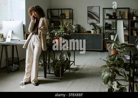 Businesswoman Working in Modern Eco Friendly Office Stock Photo