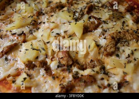 pizza with chicken and pineapple - close up Stock Photo