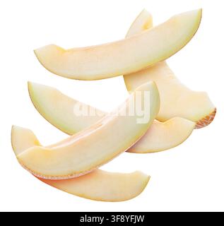 Pieces of melon flying in air on white background Stock Photo