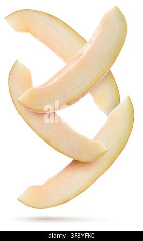 Sweet melon pieces falling on white background Stock Photo