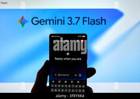 CARROLLTON, TX, USA - AUGUST 12, 2026: A person holds a smartphone showing the Gemini 3.7 Flash application with the text 'Ready when you are' on the Stock Photo