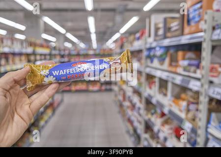 Dovgan's caramel-filled wafer rolls are a crunchy snack consisting of a thin wafer shell (made from wheat flour, eggs and margarine), filled with a cr Stock Photo