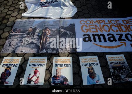 Mexico City, Mexico. 12th Aug, 2026. Placards accusing Amazon of complicity in genocide are displayed on the ground outside Centro Banamex during the AWS Summit in Mexico City, Mexico, on August 12, 2026. The protest targeted Project Nimbus, a cloud-computing contract awarded to Amazon Web Services and Google to provide services to the Israeli government, as campaigners called for technology companies to end work they say supports Israel's military operations. (Photo by Xavier Duarte/Middle East Images/StringersHub/Sipa USA) Credit: Sipa USA/Ģ����ý Live News Stock Photo