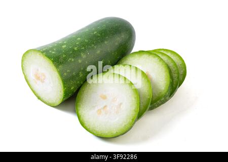 Whole and Sliced Small Green Wax Gourd Isolated on White Stock Photo