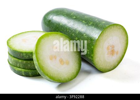 Whole and Sliced Small Green Wax Gourd Isolated on White Stock Photo