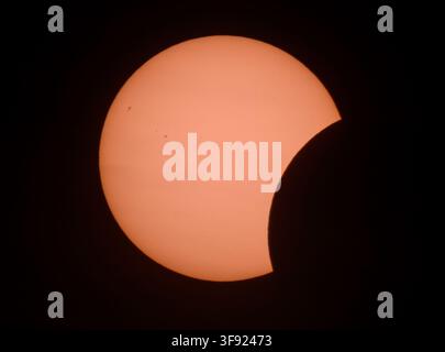 Jacobsdorf, Germany. 12th Aug, 2026. A partial solar eclipse (photographed with a special protective filter attached to the camera). On August 12, 2026, the Sun was the focus of astronomers· attention, as a significant partial solar eclipse occurred that evening. During this rare natural spectacle, the Moon obscured 80 to 90 percent of the Sun·depending on the region·across Germany, transforming it into a narrow crescent. Credit: Patrick Pleul/dpa/Ģ����ý Live News Stock Photo