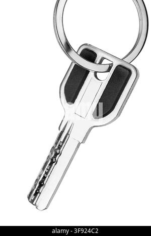 One steel door key hanging on a key ring isolated over white Stock Photo