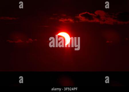 The partial solar eclipse occurred and was clearly visible at the Moon's descending node of orbit in Estonia, on Wednesday, 12 August 2026 Stock Photo
