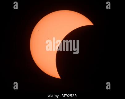 Jacobsdorf, Germany. 12th Aug, 2026. A partial solar eclipse (photographed with a special protective filter attached to the camera). On August 12, 2026, the Sun was the focus of astronomers· attention, as a significant partial solar eclipse occurred that evening. During this rare natural spectacle, the Moon obscured 80 to 90 percent of the Sun·depending on the region·across Germany, transforming it into a narrow crescent. Credit: Patrick Pleul/dpa/Ģ����ý Live News Stock Photo
