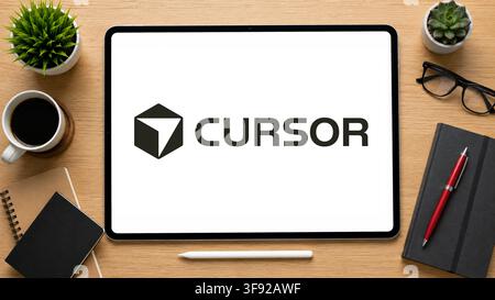 August 14, 2026: In this photo illustration, an iPad displays the Cursor AI logo on a minimalist wooden office desk, in Delhi, India on 14 August 2026. (Credit Image: © David Talukdar/ZUMA Press Wire) EDITORIAL USAGE ONLY! Not for Commercial USAGE! Stock Photo