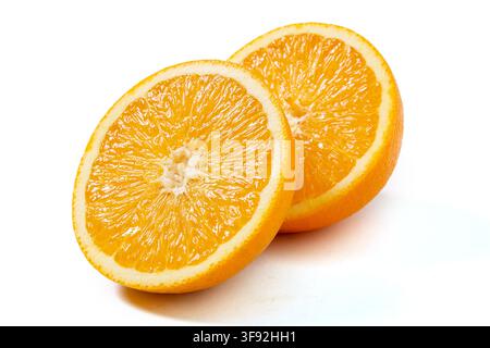 Fresh Navel Oranges Whole and Halved Showing Pulp Stock Photo