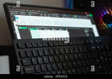 New York, USA - august 10, 2026: Importing data to Microsoft excel data spreadsheet on  computer screen with keyboard close up view Stock Photo