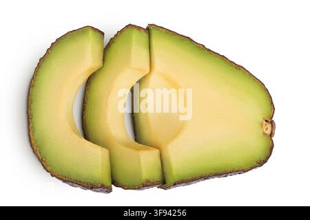 avocado pieces isolated on white background close up. Top view. Flat lay Stock Photo