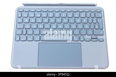 A grey tablet keyboard with a trackpad rests on a white surface Stock Photo