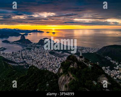 Rio de Janeiro, Brazil - 01 February 2025: Aerial view of Christ the Redeemer statue overlooking the city of Rio de Janeiro, Guanabara Bay, and Sugarl Stock Photo
