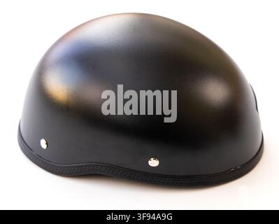 A black halfshell motorcycle helmet sits on a clean white background Stock Photo