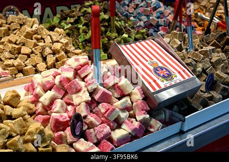 Selection of colourful British fudge sweets in trays for sale on display at candy stall during festival Stock Photo
