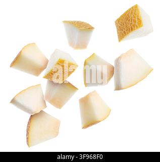 Pieces of melon flying in air on white background Stock Photo