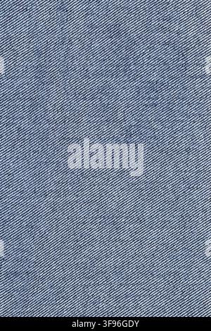 Blue denim fabric texture background. Close up of woven jeans cotton material. Rough dark blue textile surface pattern for casual fashion design and c Stock Photo