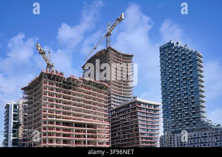 Modern high rise apartment buildings under construction Stock Photo