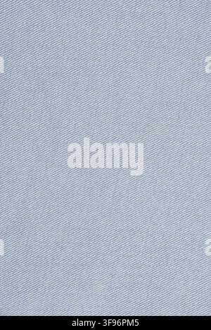 Light blue denim fabric texture. Seamless cotton cloth pattern for clothing design. Durable jean textile material background with diagonal weave struc Stock Photo