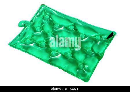 Large green chemical heating pad on a white background. Chemical heating pad close-up Stock Photo
