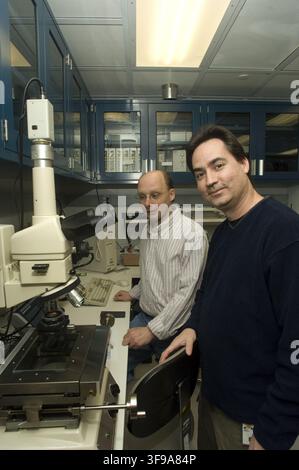 Stan Scott and Matt McGill, scientists at the Goddard Space Flight Center, with a magnetic disk, in a 2009 photograph for Tech Trends. Stock Photo