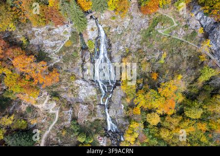 Todtnau Waterfalls multi-tiered waterfall in the Black Forest in autumn fall in Todtnau, Germany Stock Photo